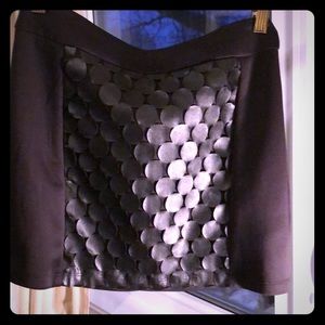 Mini skirt with faux leather print.